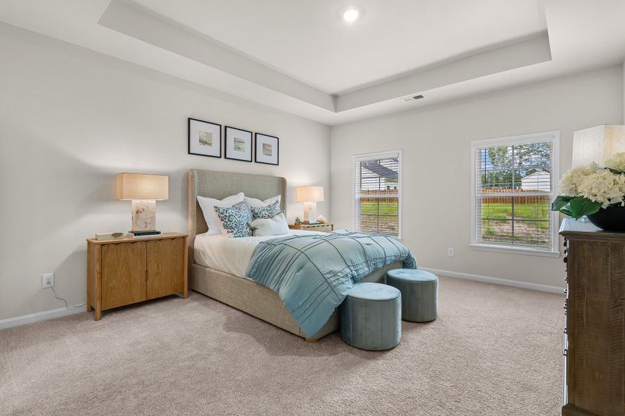 Furnished interior in a model home at Harmon Terrace in Hopkins (Image 14).