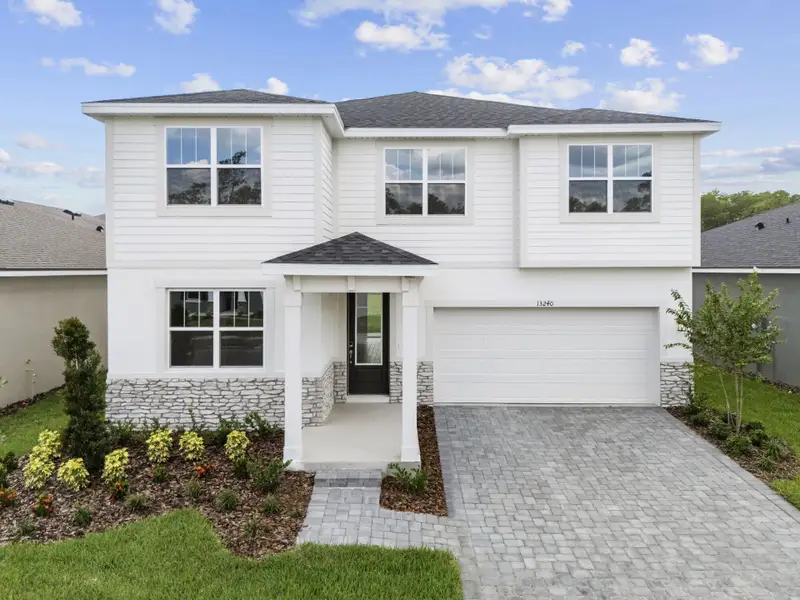 Front exterior of a home in the Rainwood community, located in Clermont, FL (Image 2).