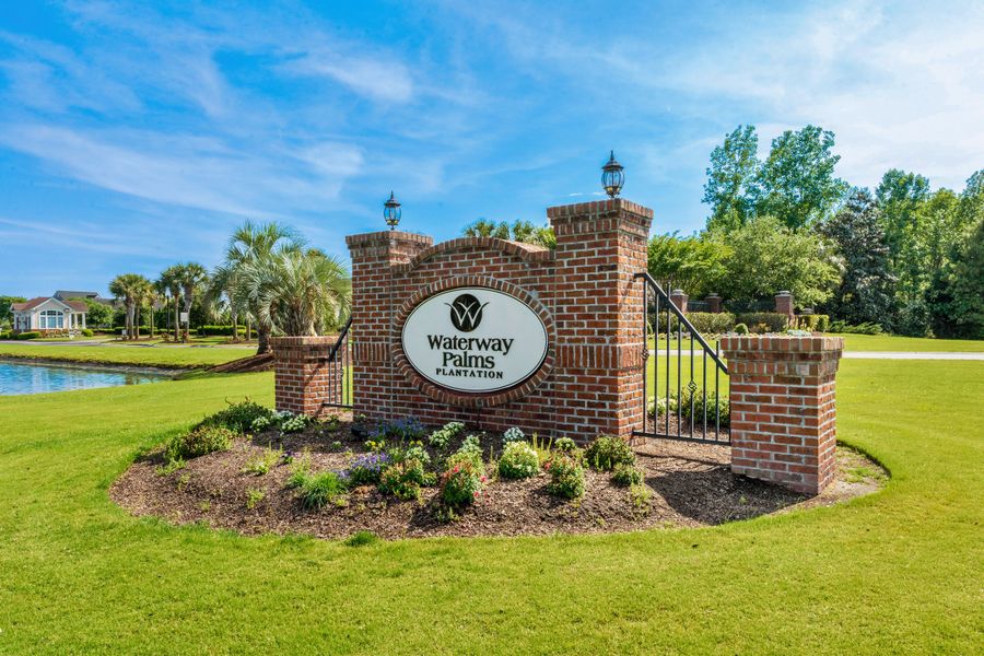 Entrance to the Waterway Palms Plantation community in Myrtle Beach, SC, featuring signage and landscaping (Image 2). Entrance to the Waterway Palms Plantation community in Myrtle Beach, SC, featuring signage and landscaping (Image 2).