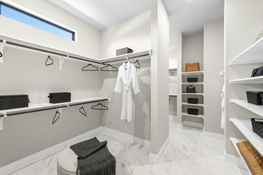 Furnished interior in a model home at Caliterra in Dripping Springs (Image 43).