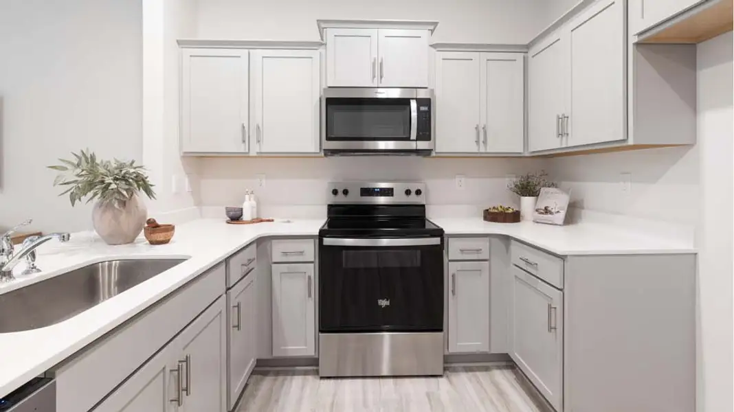 Furnished interior in a model home at The Townes at Troutman in Troutman (Image 3).