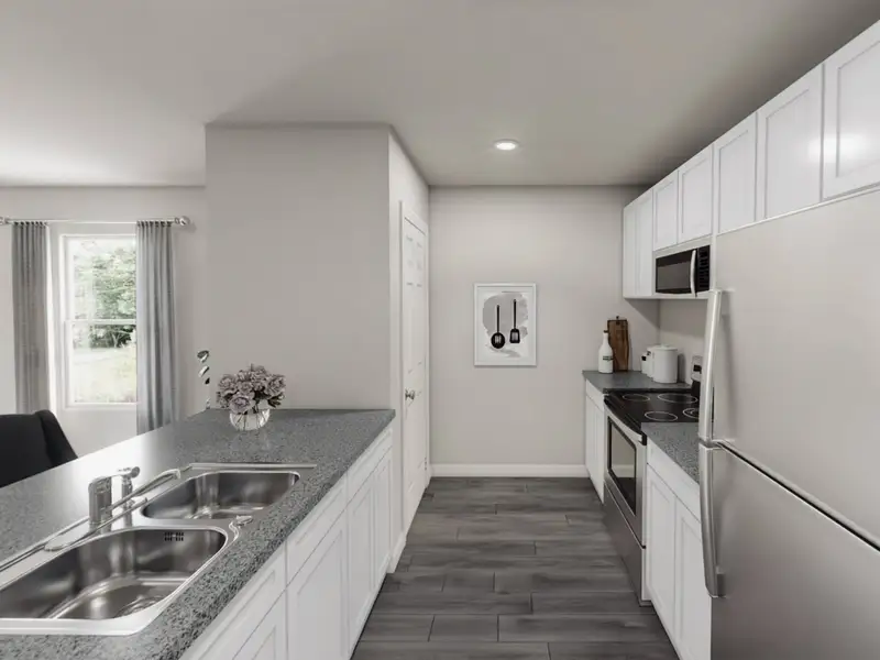 Furnished interior in a model home at Thomas Estates in La Grange (Image 29).