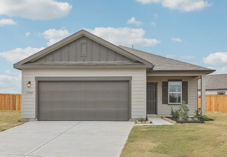 Front exterior of a home in the Spring Creek Trails community, located in Magnolia, TX (Image 4).