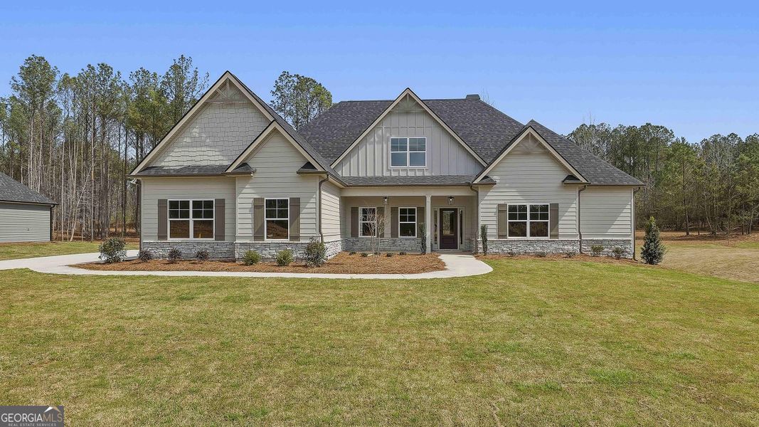 Front exterior of a home in the Fox Hall Phase V community, located in Senoia, GA (Image 4).
