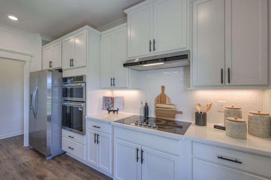 Furnished interior in a model home at Langford Farms in Gallatin (Image 29).