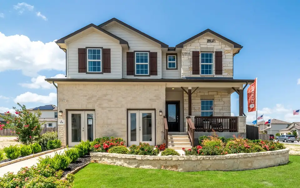 Front exterior of a home in the Hunter's Ranch community, located in San Antonio, TX (Image 3).
