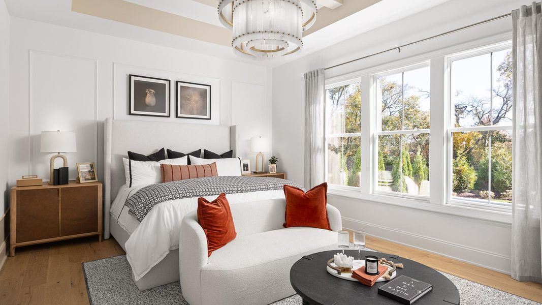 Luxurious and oversized primary bedroom