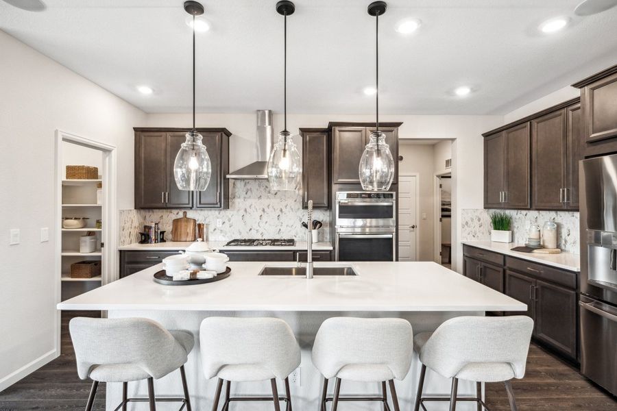 Furnished interior in a model home at The Aurora Highlands Landmark Collection in Aurora (Image 19).