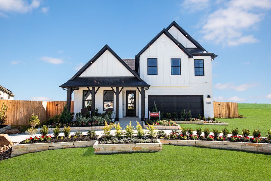 Front exterior of a home in the Arabella on the Prairie: Heritage Collection community, located in Richmond, TX (Image 6).
