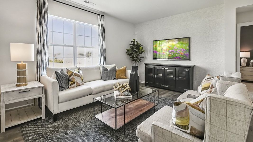 Furnished interior in a model home at The Landing at Winston Pointe in Clayton (Image 7). Furnished interior in a model home at The Landing at Winston Pointe in Clayton (Image 7).