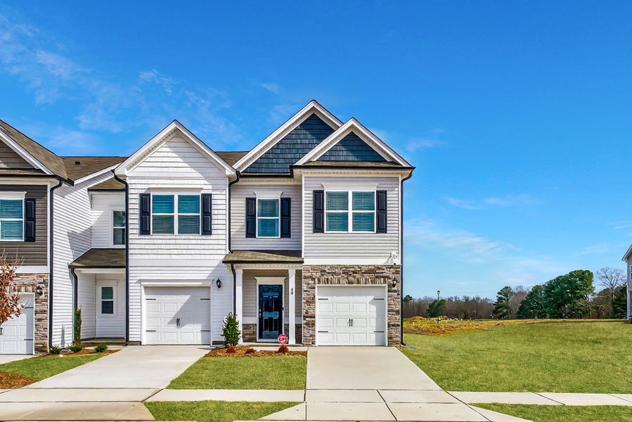 Front exterior of a home in the The Townes at Cape Overlook community, located in Lillington, NC (Image 5). Front exterior of a home in the The Townes at Cape Overlook community, located in Lillington, NC (Image 5).