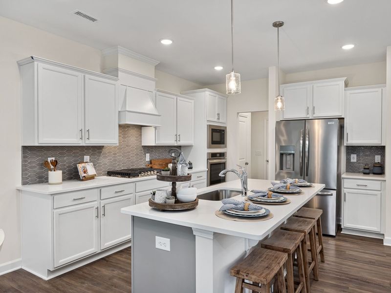 Furnished interior in a model home at Gregory Village Townhomes in Lillington (Image 8).