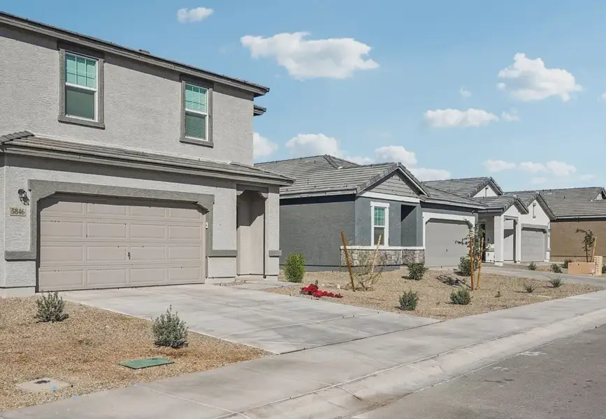 Front exterior of a home in the Agave Trails community, located in Buckeye, AZ (Image 4).