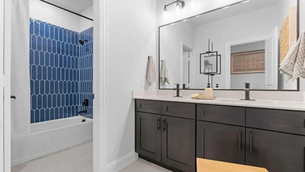 Furnished interior in a model home at Grace Woods in Carrollton (Image 41).