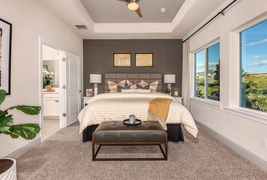 Furnished interior in a model home at John's Lake Landing - Cottage Series in Clermont (Image 9).