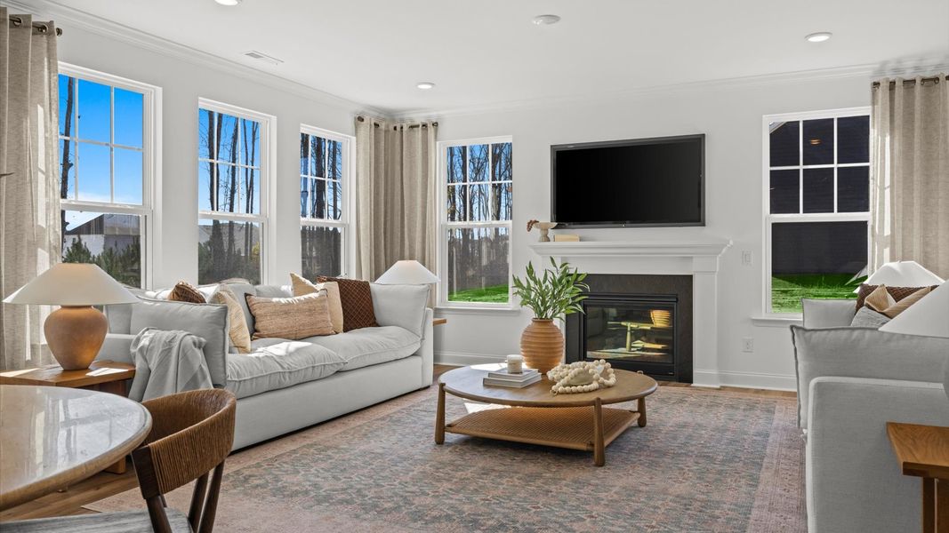 Furnished interior in a model home at Whispering Pines in Franklinton (Image 9).