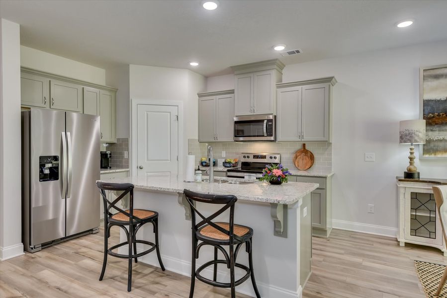 Furnished interior in a model home at Forrest Bluff in North Augusta (Image 8).