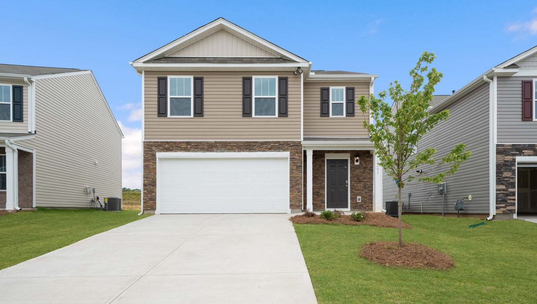 Front exterior of a home in the Lenhardt Grove community, located in Easley, SC (Image 1). Front exterior of a home in the Lenhardt Grove community, located in Easley, SC (Image 1).