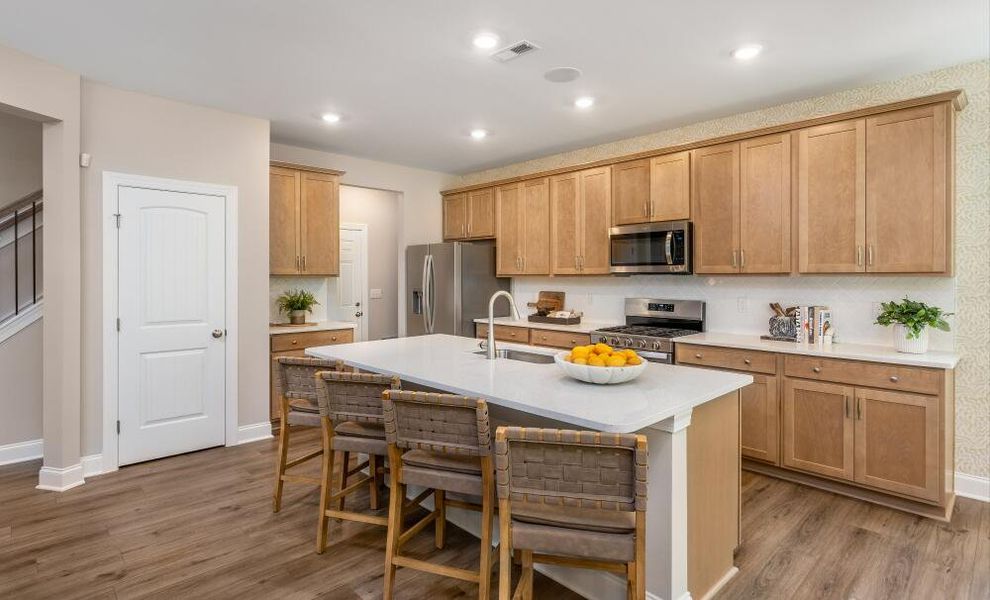 Furnished interior in a model home at Running Brook Townes in Durham (Image 5).