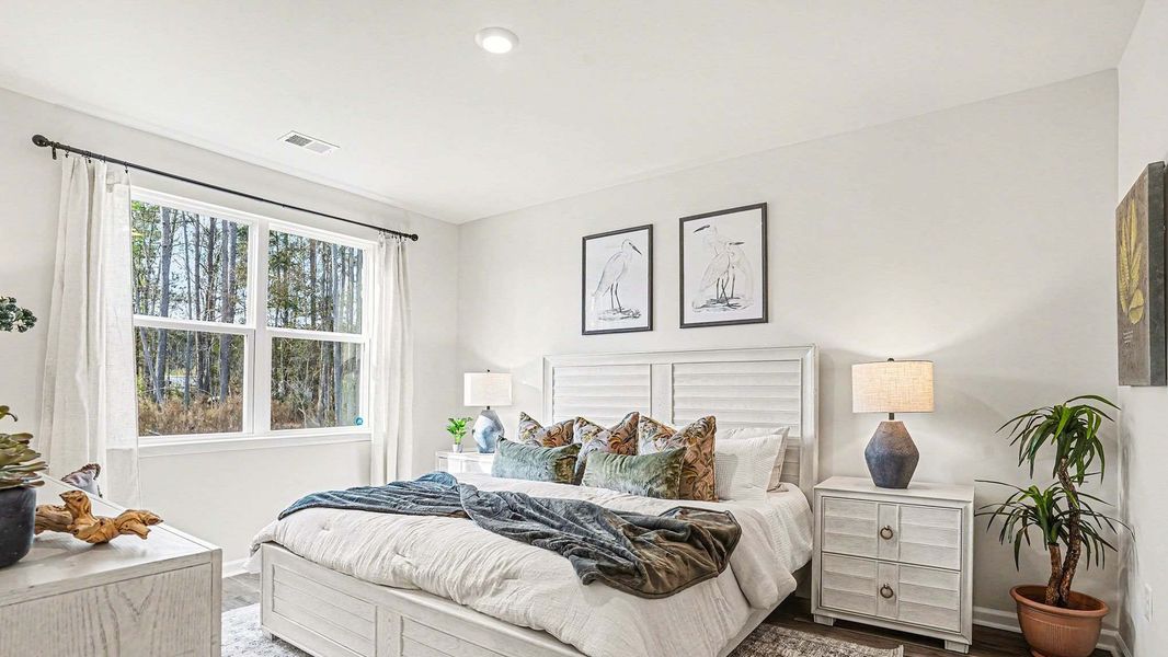 Furnished interior in a model home at Winfield Farms in Myrtle Beach (Image 9).