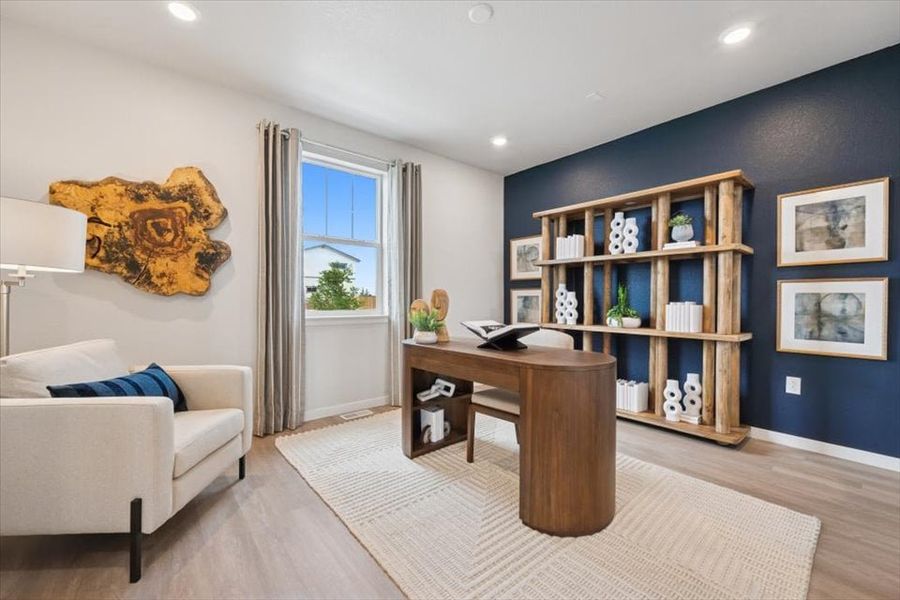 A living room with a table and a couch.
