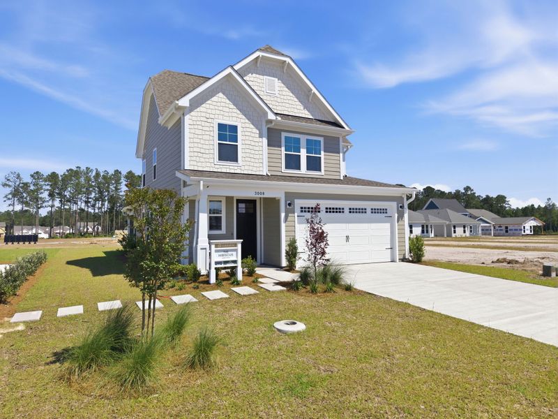 Front exterior of a home in the Terrapin community, located in Leland, NC (Image 5). Front exterior of a home in the Terrapin community, located in Leland, NC (Image 5).