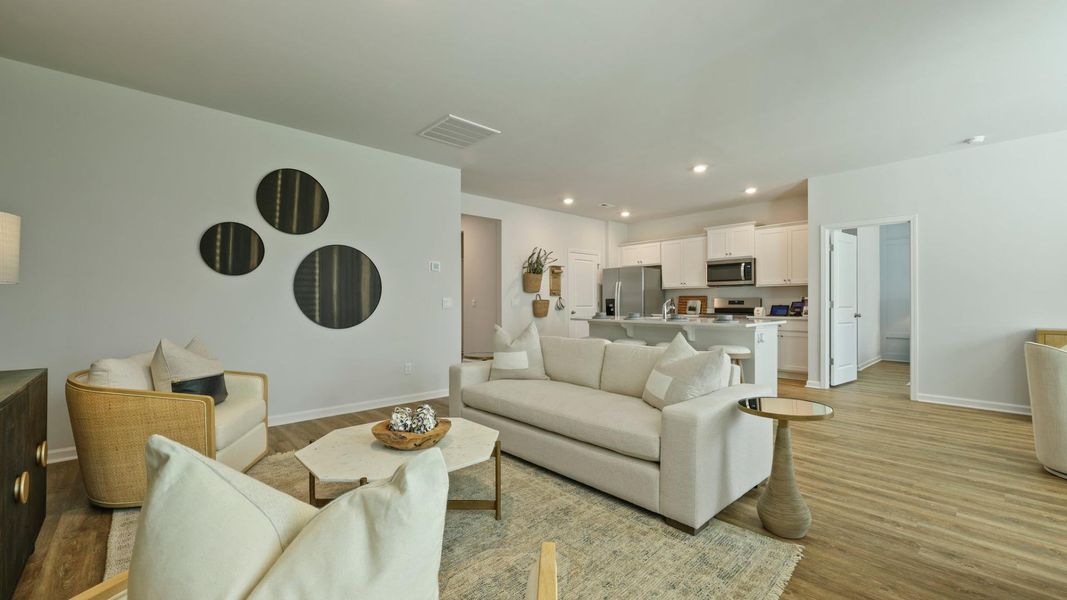 Furnished interior in a model home at Pineview North in Summerville (Image 14).