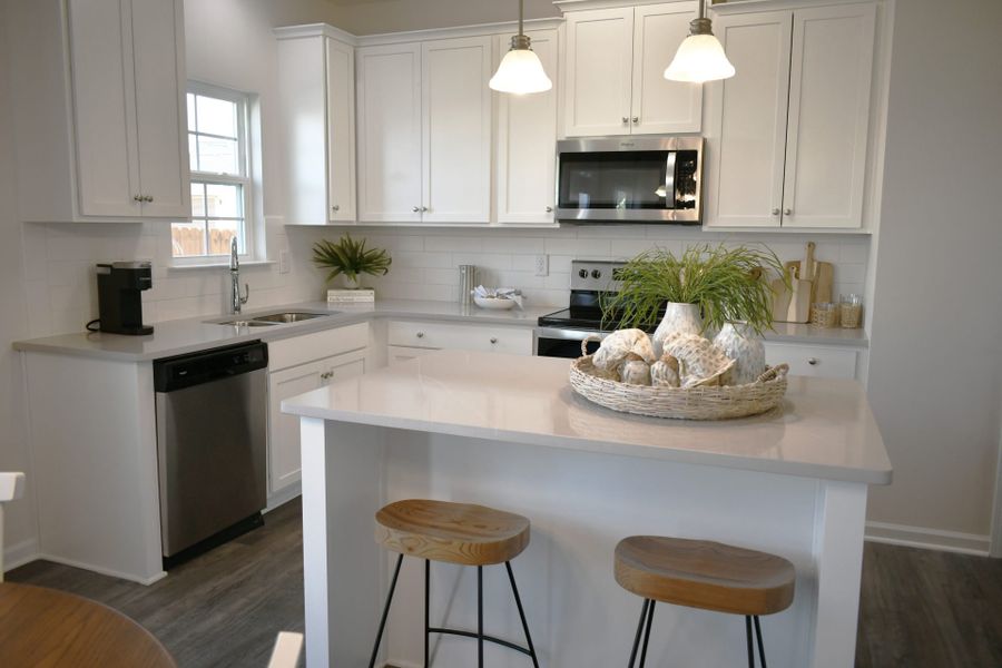 Furnished interior in a model home at Brassfield Meadows in Burlington (Image 36).