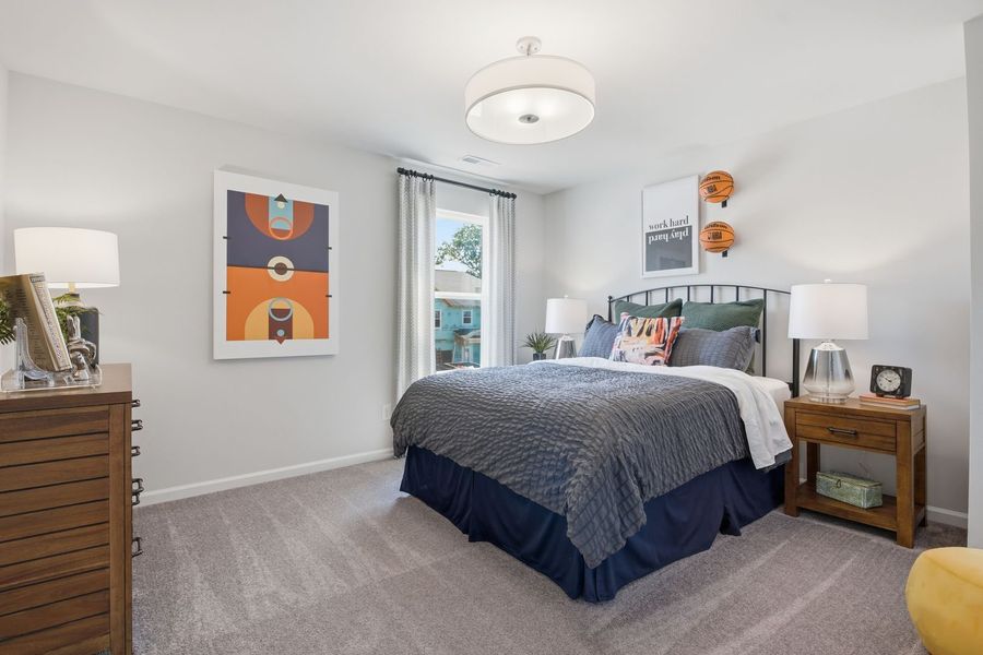 Furnished interior in a model home at Clairmont in Charlotte (Image 24).