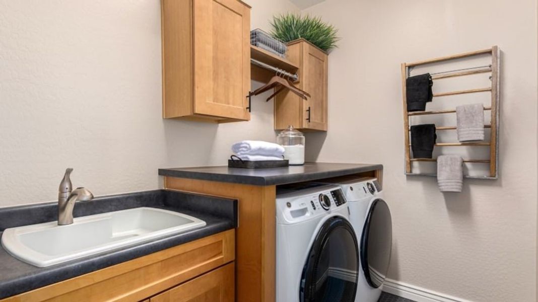 Furnished interior in a model home at Alamar Encore Collection in Avondale (Image 31).