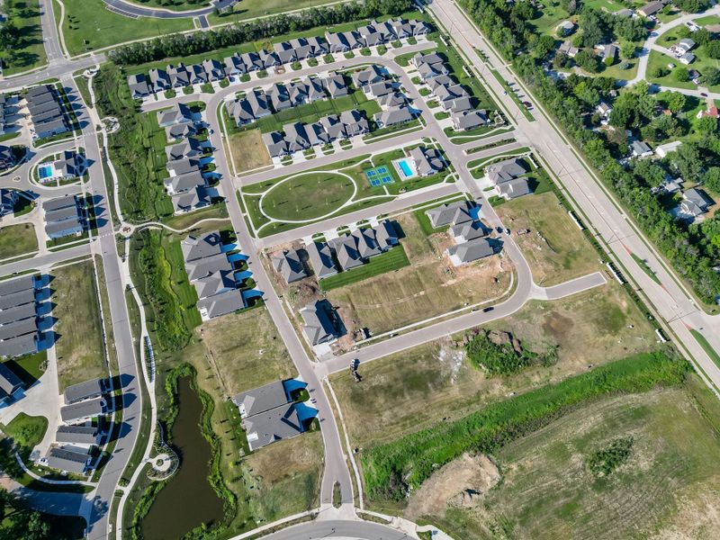 Aerial view of the The Courtyards at The Heritage community in Andover, KS, showing layout and nearby surroundings (Image 12). Aerial view of the The Courtyards at The Heritage community in Andover, KS, showing layout and nearby surroundings (Image 12).