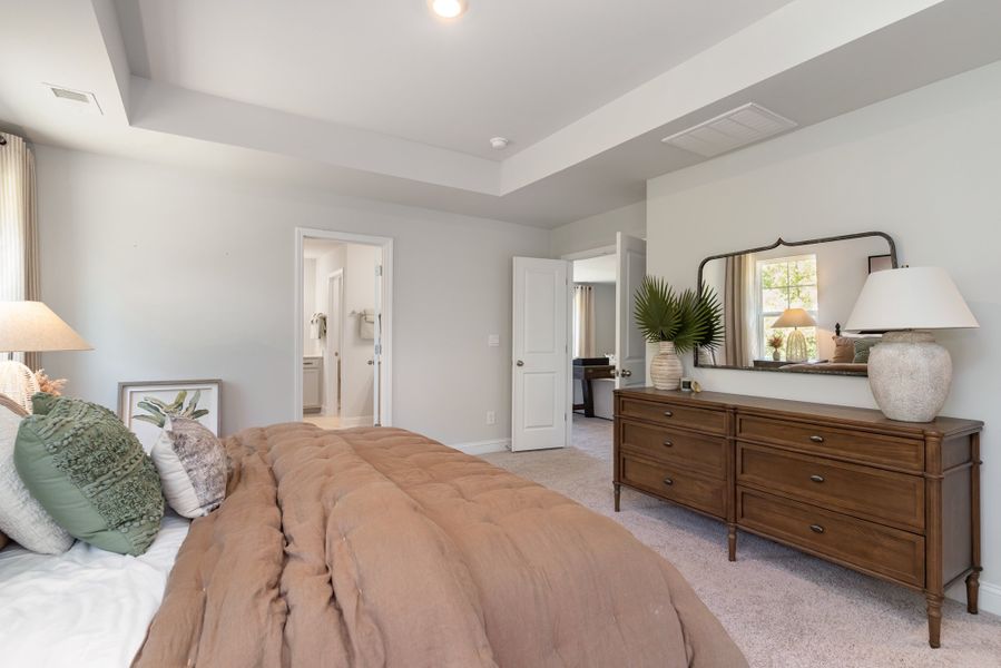 Furnished interior in a model home at Waterbridge in Myrtle Beach (Image 50).