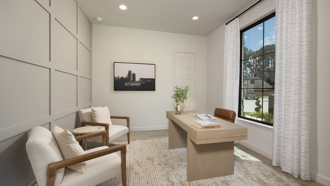 Furnished interior in a model home at The Highlands 65' in Porter (Image 7).