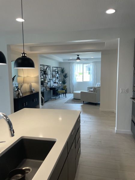 Furnished interior in a model home at Ellsworth Ranch Capstone Collection in Queen Creek (Image 11).