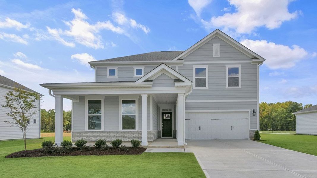 Front exterior of a home in the Eagle Creek community, located in Fuquay Varina, NC (Image 9).
