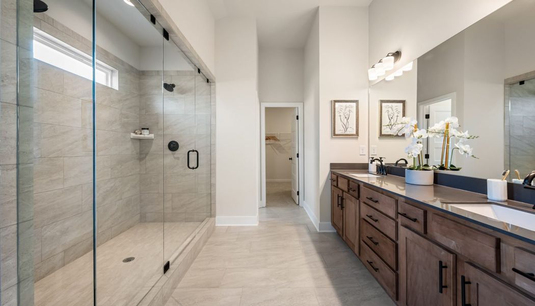 Furnished interior in a model home at Pinecrest Ridge in Dacula (Image 34).