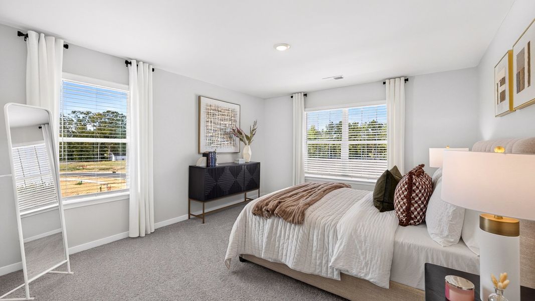 Furnished interior in a model home at Twinleaf Meadows in Monroe (Image 28).