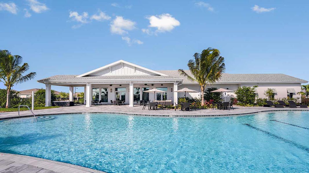 Front exterior of a home in the The Cove at West Port community, located in Port Charlotte, FL (Image 9). Front exterior of a home in the The Cove at West Port community, located in Port Charlotte, FL (Image 9).