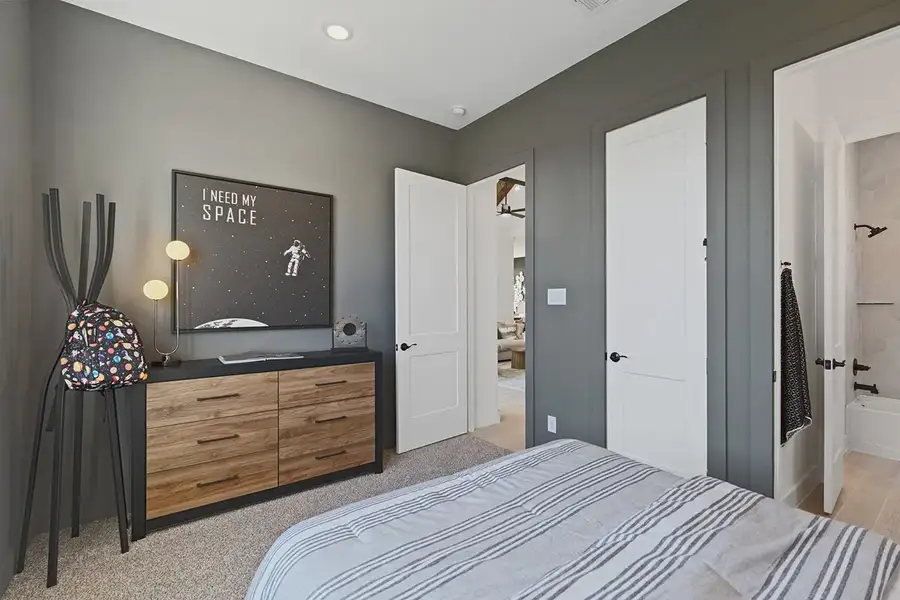Furnished interior in a model home at Brookewater 60's in Rosenberg (Image 31).