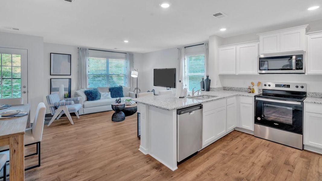 Furnished interior in a model home at Hudson Terrace Townhomes in Bristol (Image 2).