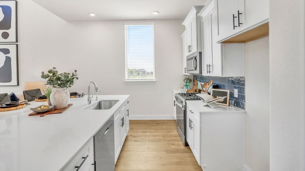 Furnished interior in a model home at The Avenue in Allen (Image 6).
