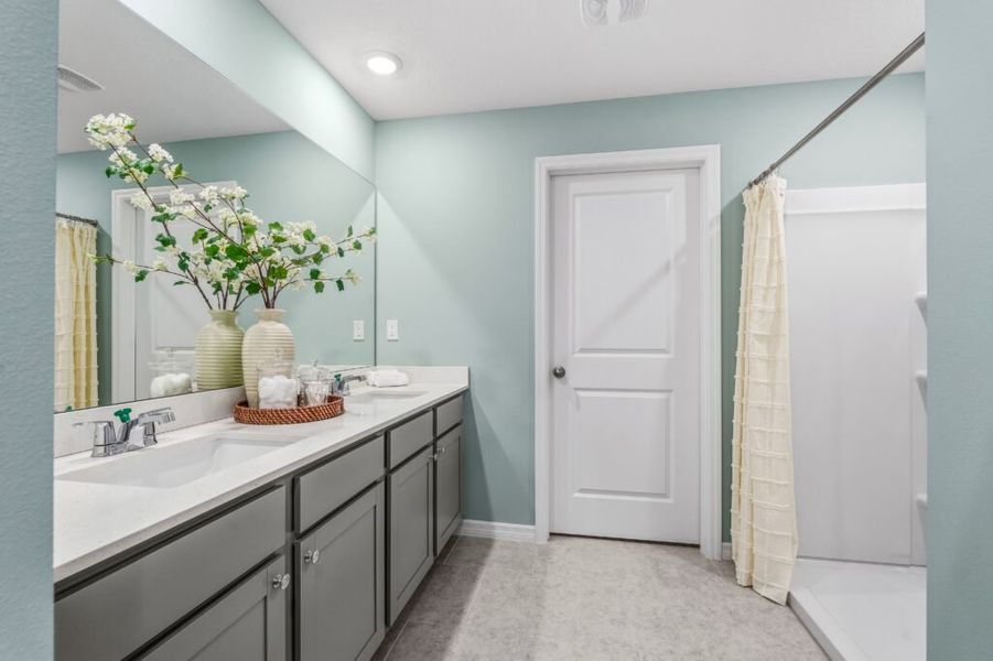Furnished interior in a model home at Spanish Lakes in Port St. Lucie (Image 21).