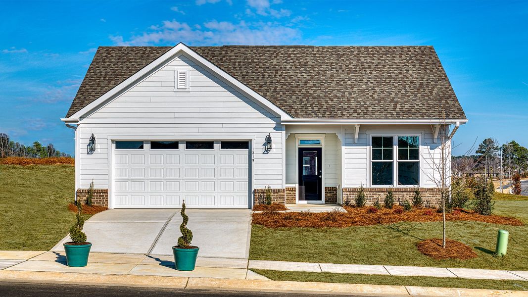 Front exterior of a home in the The Cottages at 78 North community, located in Sanford, NC (Image 1). Front exterior of a home in the The Cottages at 78 North community, located in Sanford, NC (Image 1).