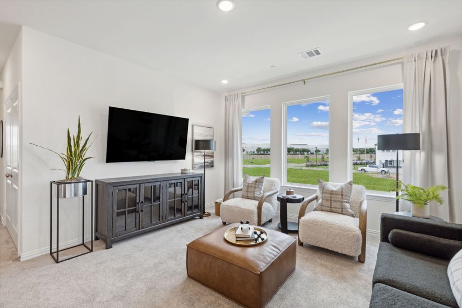 Furnished interior in a model home at Twin Creeks Watters in Allen (Image 28).