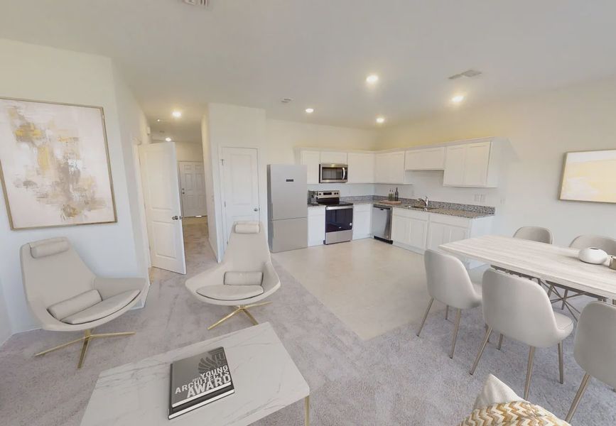 Furnished interior in a model home at Temples Crossing in Davenport (Image 6).