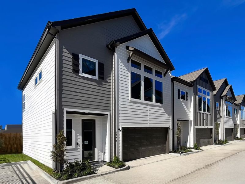 Front exterior of a home in the Broadway Square community, located in Houston, TX (Image 2). Front exterior of a home in the Broadway Square community, located in Houston, TX (Image 2).