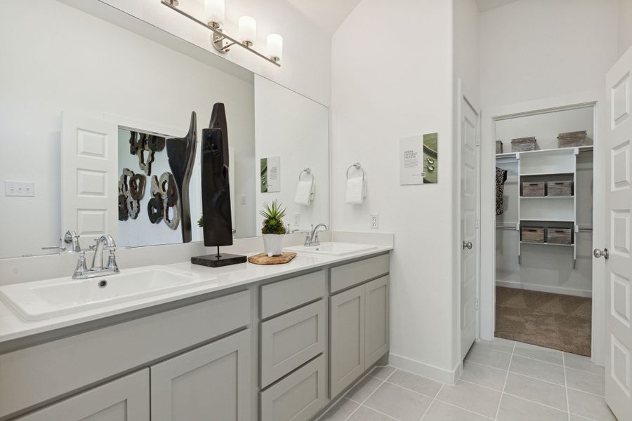 Primary suite bathroom in a LakePointe new home in Lavon TX by Trophy Signature Homes