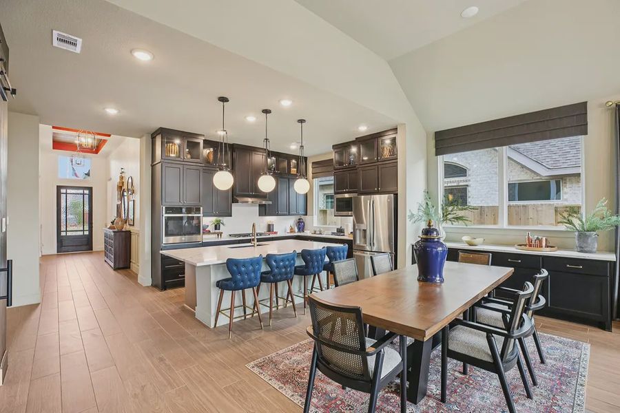 Furnished interior in a model home at Meridiana 50's in Manvel (Image 18).