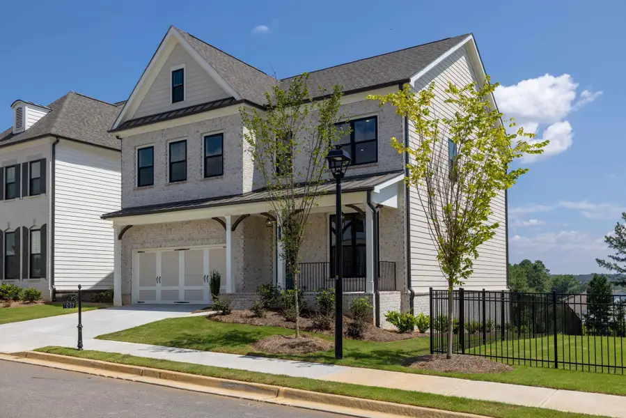 Front exterior of a home in the Waterhaven community, located in Cumming, GA (Image 2).