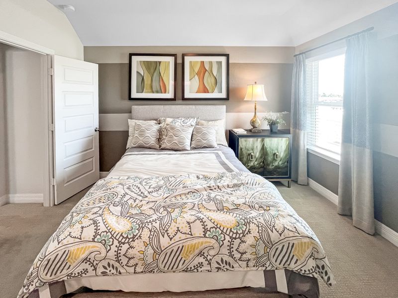 Furnished interior in a model home at Trails at Woodhaven Lakes in La Marque (Image 17).